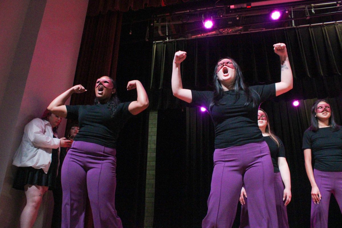 New members Yavilka Peñaloza and Sofia Carrizales of the Associate Chapter of Sigma Lambda Gamma Sorority, Inc. flex their muscles during their reveal Friday night, April 18, 2026.