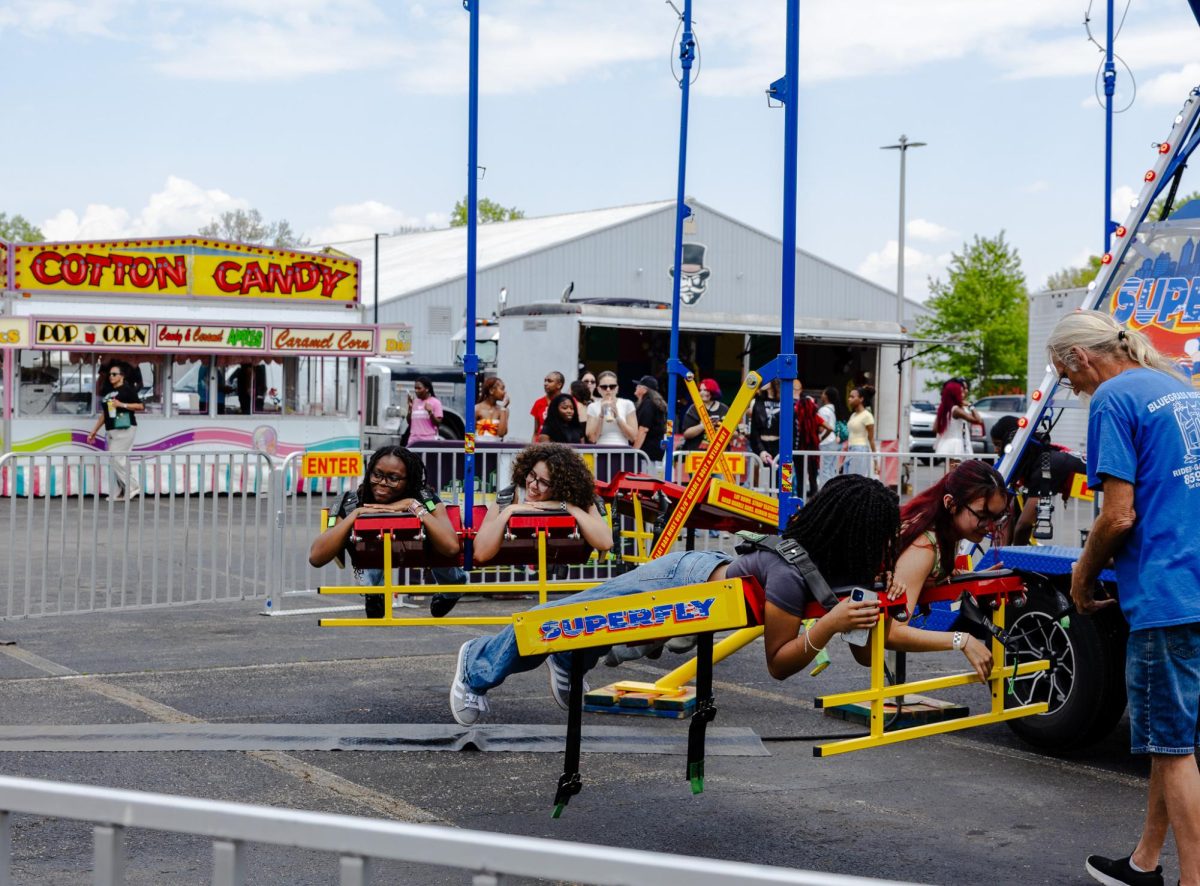 Austin Peay State University junior Laure Kidukula and sophomore Desiree Brown attend the Springtacular carnival, Saturday, April 11, at the Fortera Stadium parking lot, hosted by the Office of Student Life and Engagement and the Student Government Association.