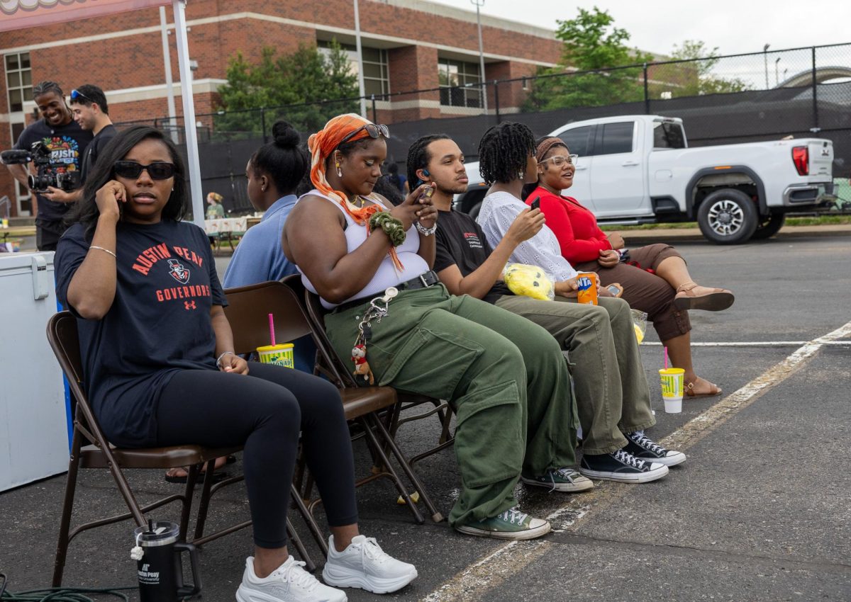 Austin Peay State University carnival attendees wait in line for shawarma plates, Saturday, April 11, during the Springtacular carnival at the Fortera Stadium parking lot, hosted by the Office of Student Life and Engagement and the Student Government Association.. 