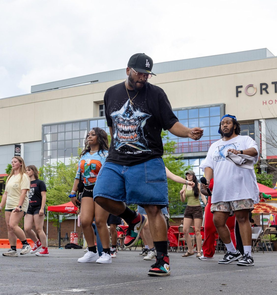 Austin Peay State University students line dance during the Springtacular carnival, Saturday, April 11, in the Fortera Stadium parking lot, hosted by the Office of Student Life and Engagement and the Student Government Association.