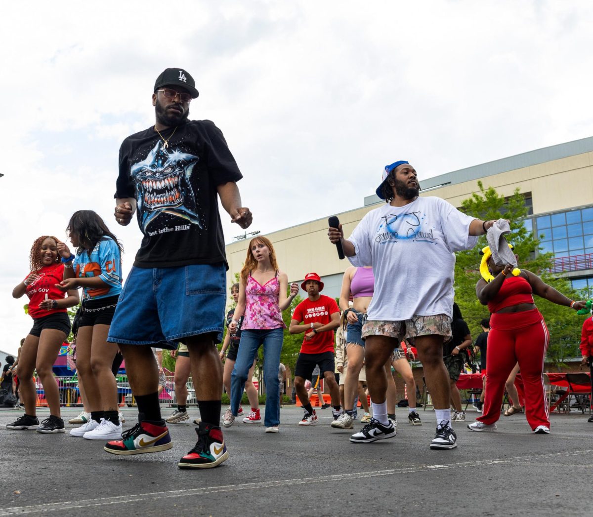 Austin Peay State University students line dance during the Springtacular carnival, Saturday, April 11, in the Fortera Stadium parking lot, hosted by the Office of Student Life and Engagement and the Student Government Association.