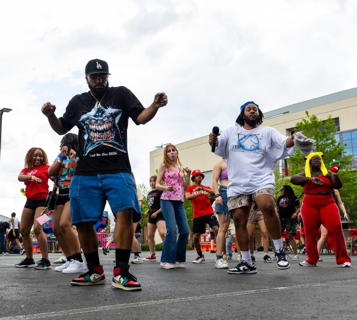 Austin Peay State University students line dance during the Springtacular carnival, Saturday, April 11, in the Fortera Stadium parking lot, hosted by the Office of Student Life and Engagement and the Student Government Association.