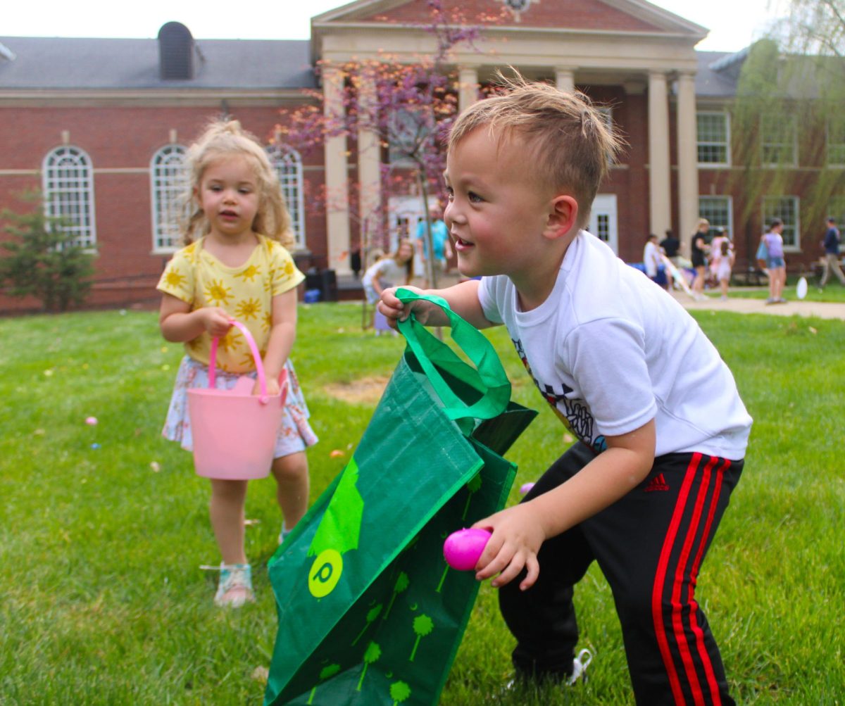 A child finds an egg during the annual Austin Peay Easter egg hunt on Saturday, April 4, in front of the Browning building.