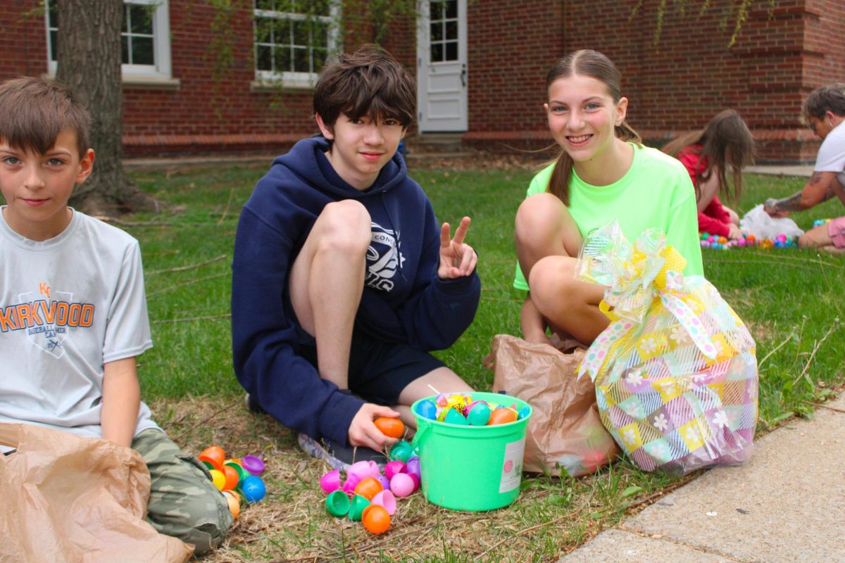 Children count their eggs together during the annual Austin Peay Easter egg hunt on Saturday, April 4, in front of the Browning building.