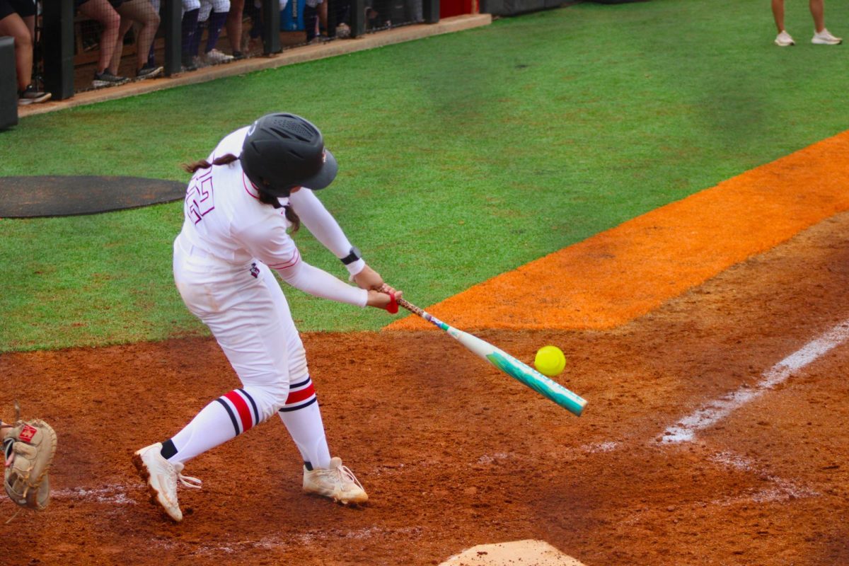 Austin Peay State University junior catcher Natalie Burns hits the ball in a 6-0 win over Lipscomb University in the first game of a doubleheader, Saturday, April 11, 2026.