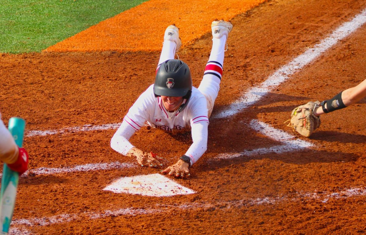 Austin Peay State University junior shortstop Brie Howard slides home in a 3-2 win over Lipscomb University in the second game of a doubleheader, Saturday, April 11, 2026.