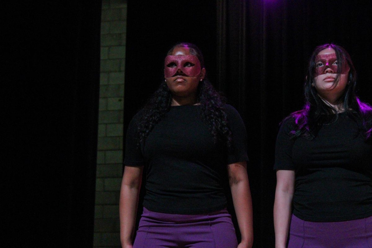 New member Yavilka Peñaloza of the Associate Chapter of Sigma Lambda Gamma Sorority, Inc. looks out at the crowd during her reveal Friday night, April 18, 2026.