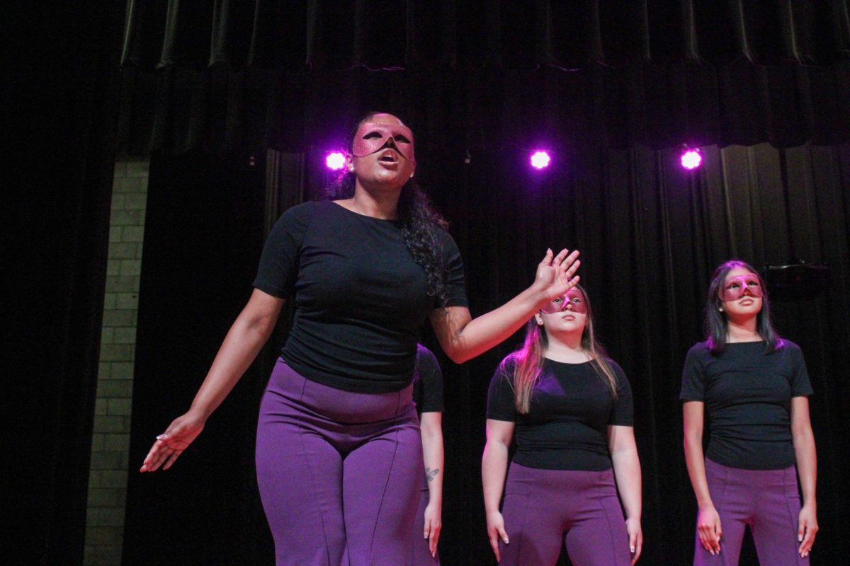 New member Yavilka Peñaloza of the Associate Chapter of Sigma Lambda Gamma Sorority, Inc. speaks to the crowd during her reveal Friday night, April 18, 2026.
