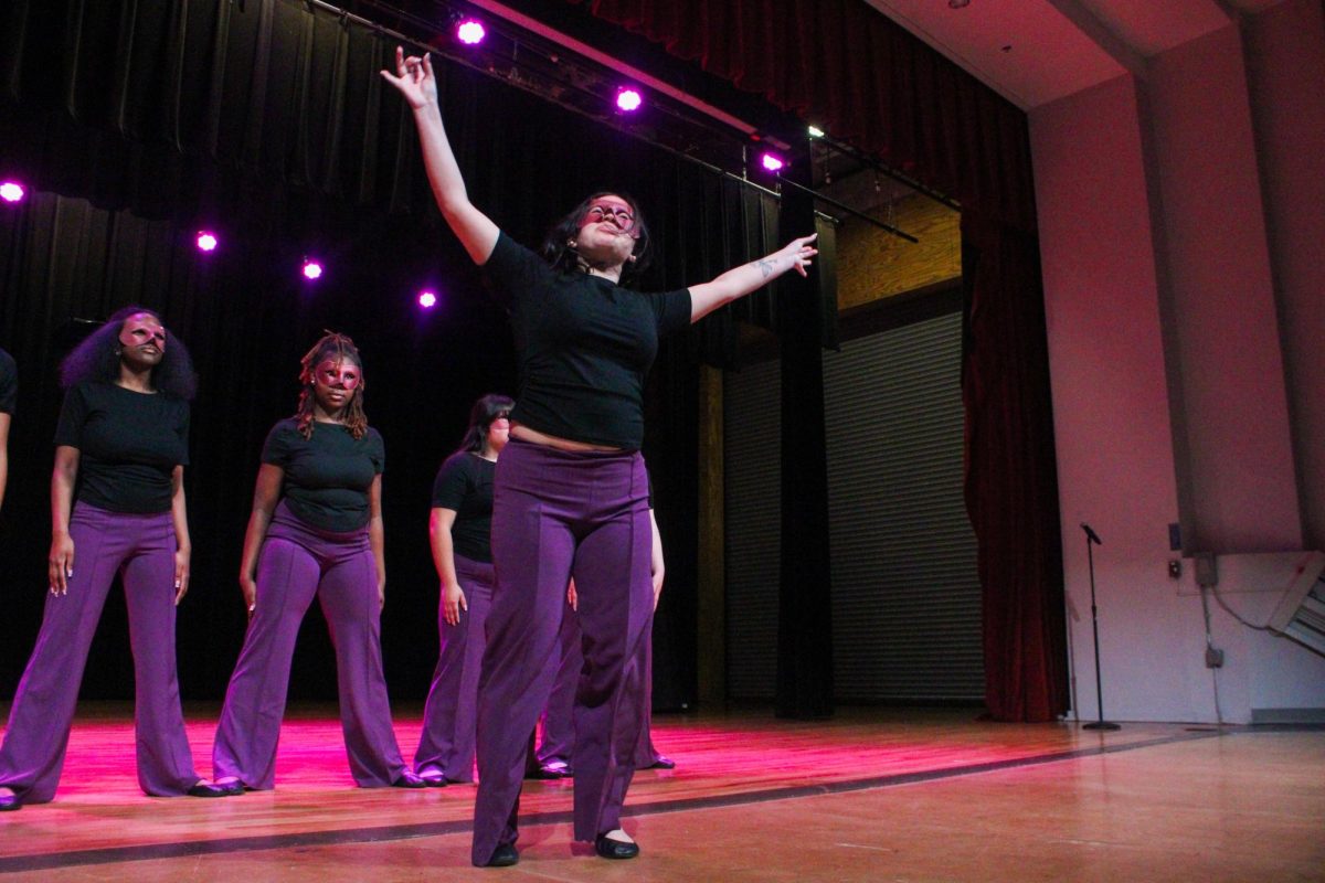 New member Sofia Carrizales of the Associate Chapter of Sigma Lambda Gamma Sorority, Inc. steps during her reveal Friday night, April 18, 2026.