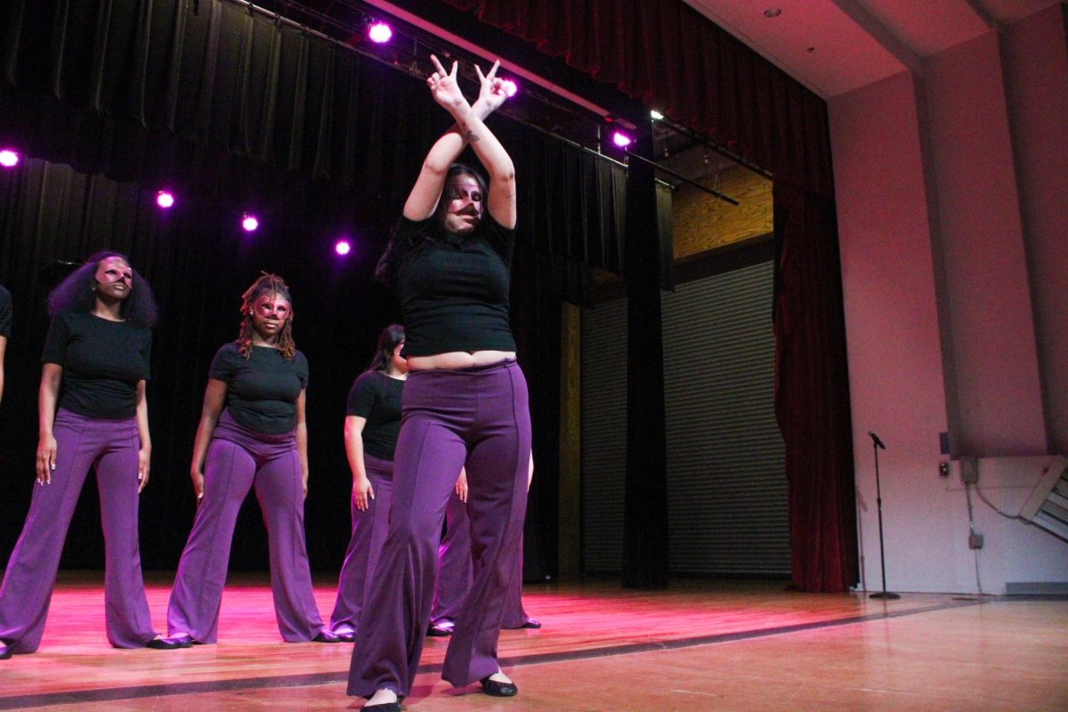 New member Sofia Carrizales of the Associate Chapter of Sigma Lambda Gamma Sorority, Inc. dances during her reveal Friday night, April 18, 2026.