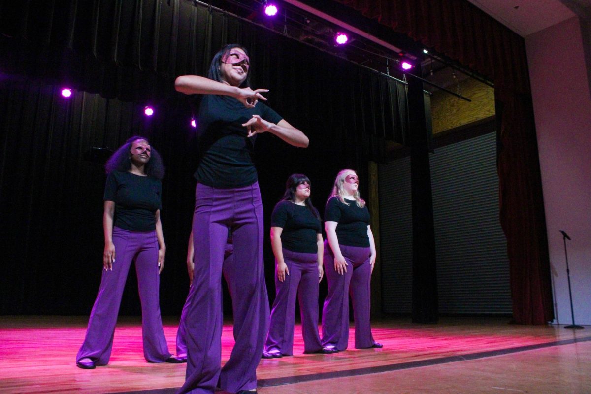 New member Nora Somers of the Associate Chapter of Sigma Lambda Gamma Sorority, Inc. dances during her reveal Friday night, April 18, 2026.