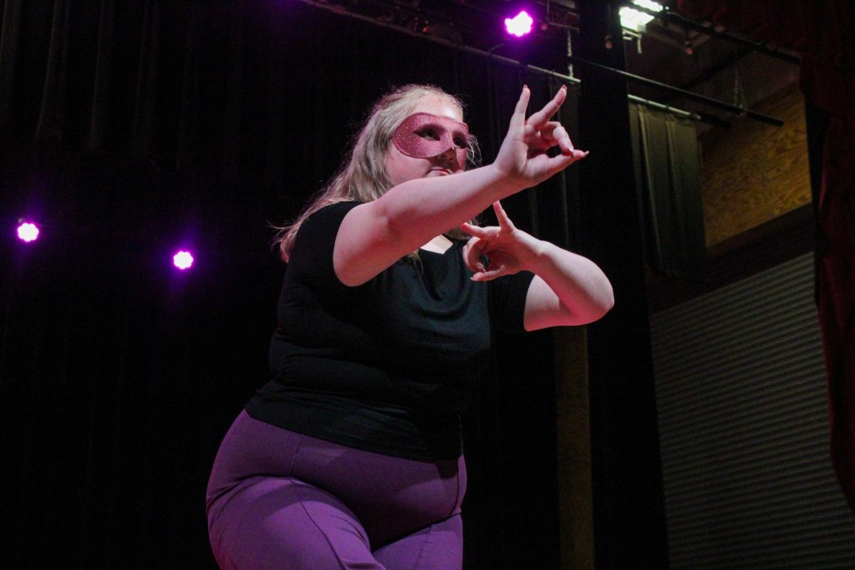 New member Ada Lewallen of the Associate Chapter of Sigma Lambda Gamma Sorority, Inc. poses during her reveal Friday night, April 18, 2026.