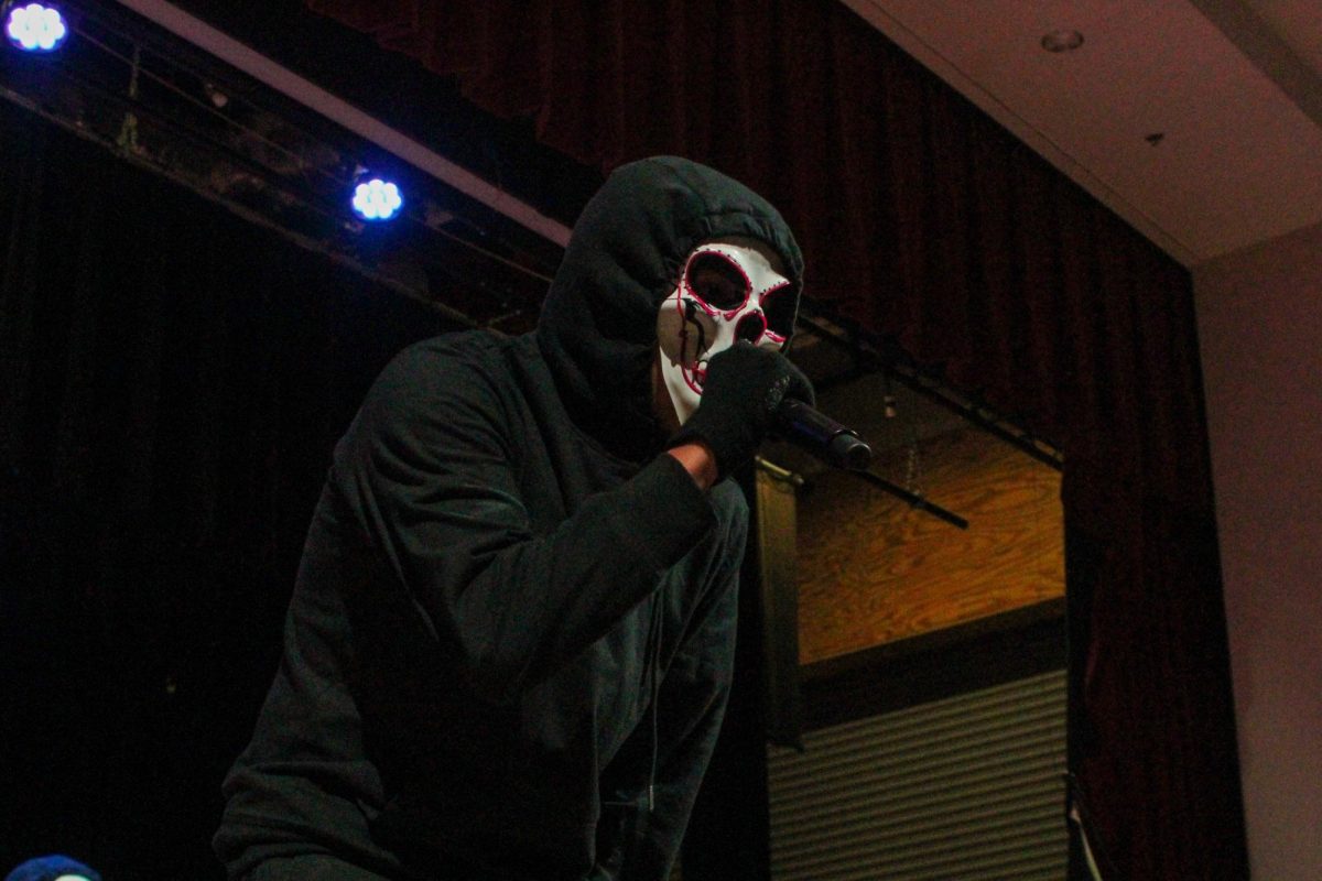 Austin Peay State University’s first-ever Sigma Lambda Beta chapter member Bryan Najera talks to the crowd before revealing himself Saturday, April 18, 2026.