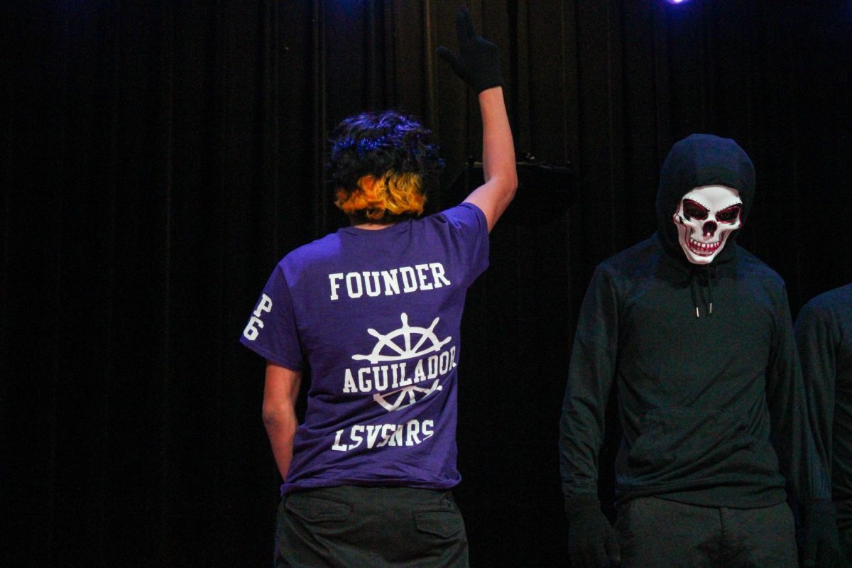 Austin Peay State University’s first-ever Sigma Lambda Beta chapter member Bryan Najera poses with his back to the crowd after revealing himself Saturday, April 18, 2026.