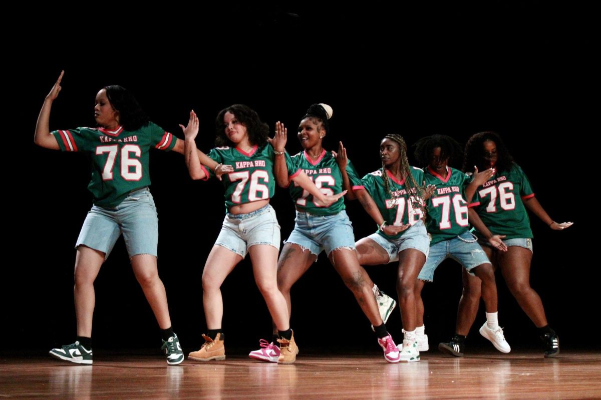 Kappa Rho chapter of Alpha Kappa Alpha members lock arms and walk off the stage during the fast round of the NPHC Stroll Off on Friday, April 24, 2026.