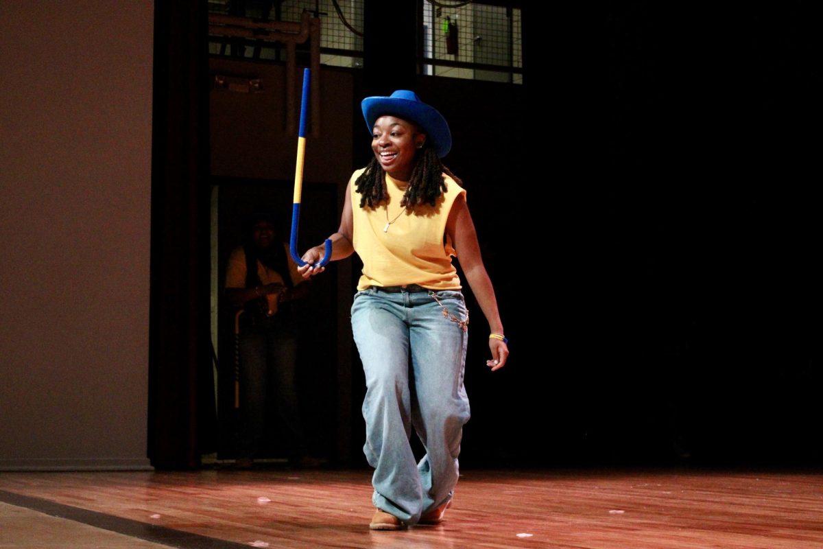 A Nu Zeta chapter member of Sigma Gamma Rho strolls and shimmies during the freestyle round of the NPHC Stroll Off on Friday, April 24, 2026.