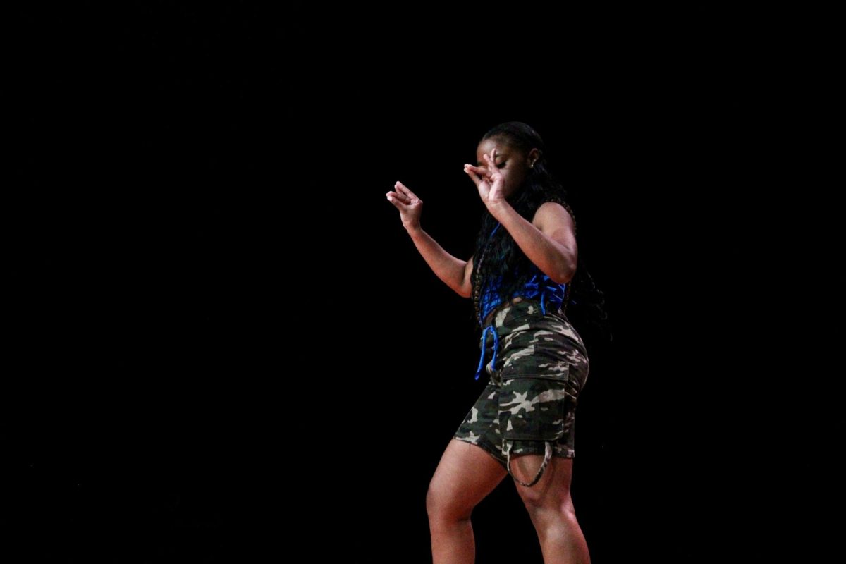 A Gamma Nu chapter member of Zeta Phi Beta poses during the freestyle round of the NPHC Stroll Off on Friday, April 24, 2026.