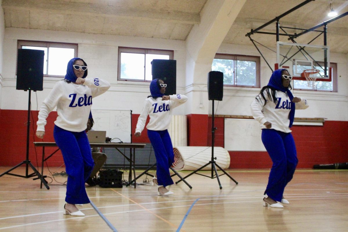 New members Mya Saunders, Sidney Miller and Rakyiah Wicks of the Gamma Nu chapter of Zeta Phi Beta Sorority, Inc. step in unison before their reveal on Monday, April 27, 2026.