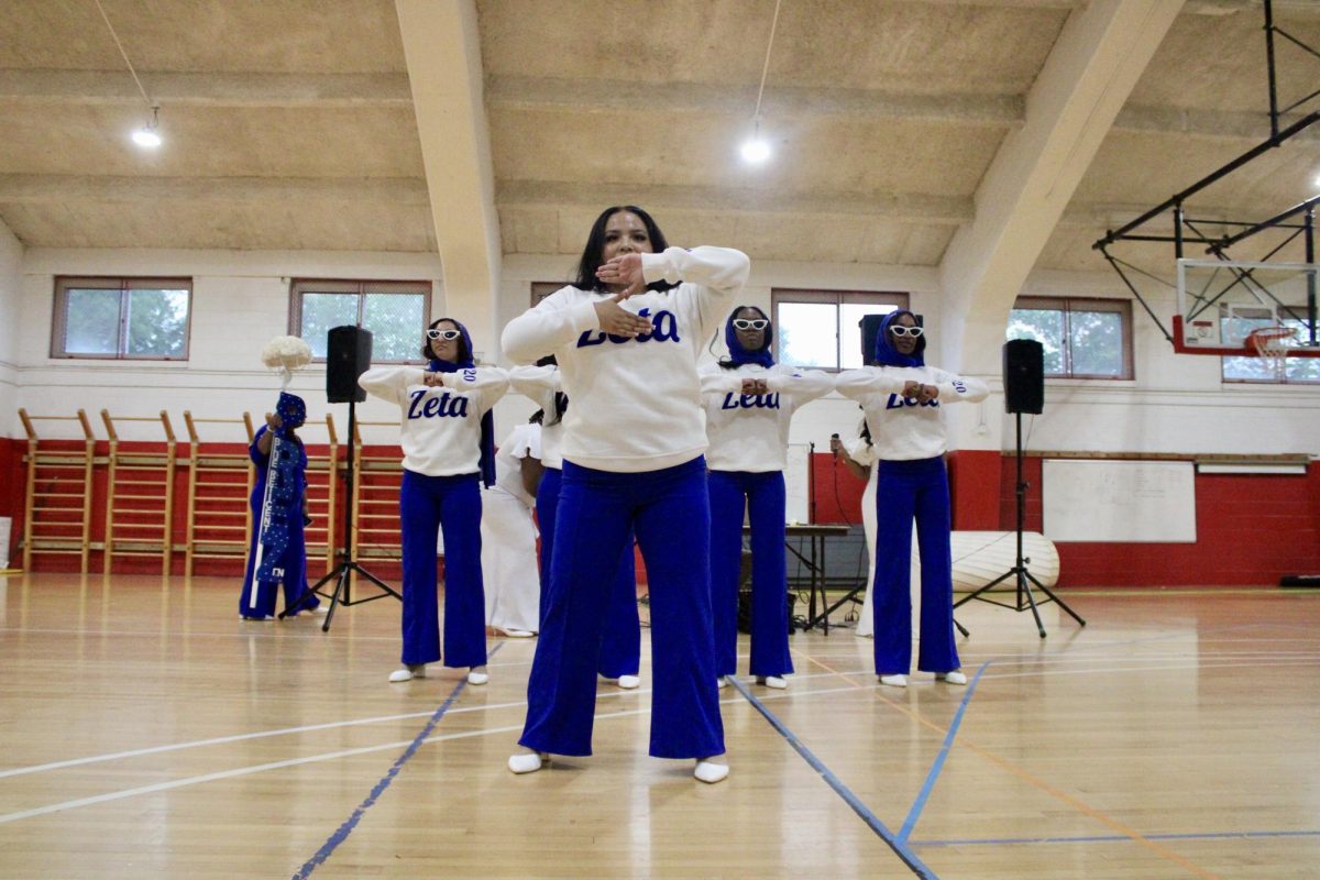 New member Crystel Martinez Rivera of the Gamma Nu chapter of Zeta Phi Beta Sorority, Inc. forms a “Z” with her hands during her reveal on Monday, April 27, 2026.