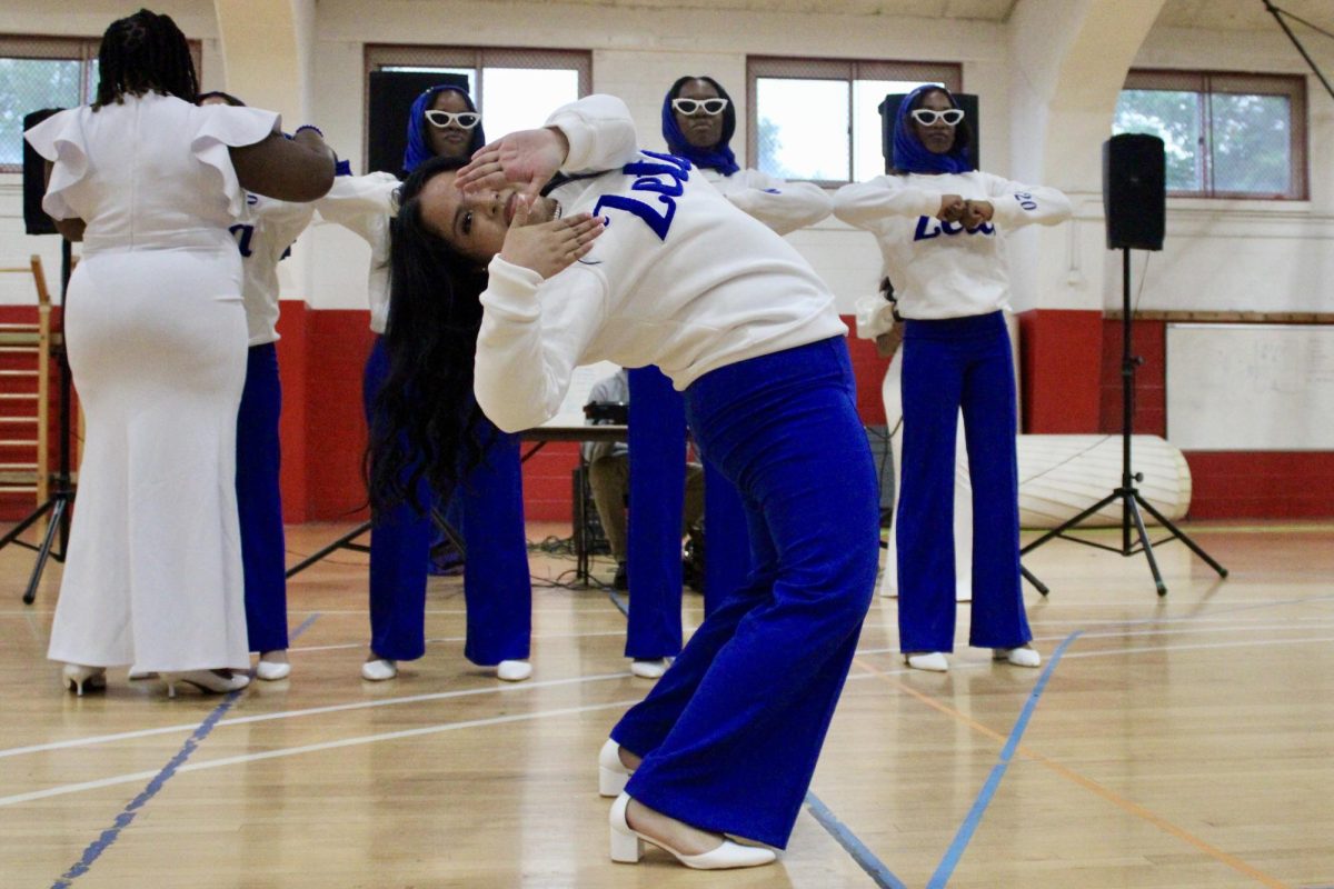 New member Crystel Martinez Rivera of the Gamma Nu chapter of Zeta Phi Beta Sorority, Inc. bends backward and forms a “Z” with her hands during her reveal on Monday, April 27, 2026.